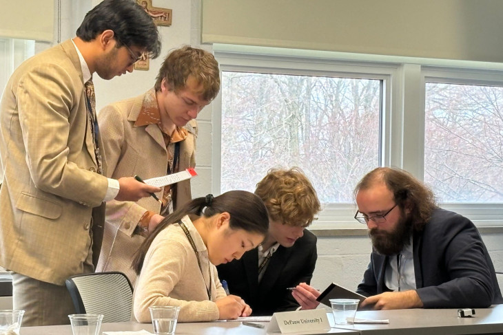 Students discussing during competition