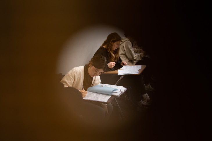 Woman reading in class