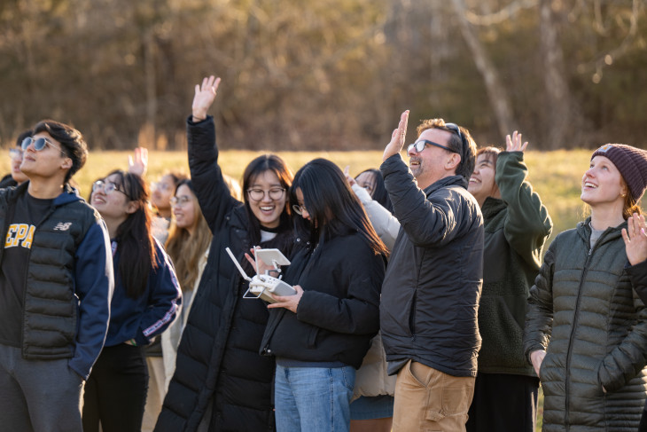 Students using a drone for class