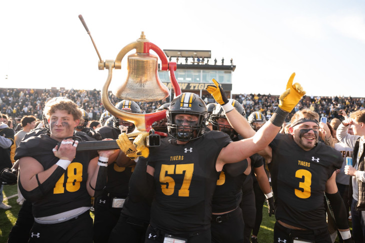 Football team celebrates with Monon Bell