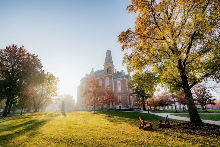 East College lawn with sun rising behind