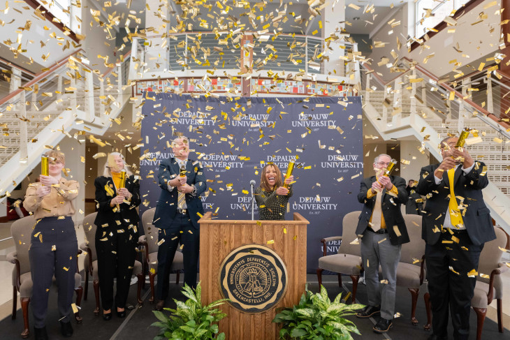 DePauw staff, students, faculty, and president celebrate with confetti after receiving funds to support the pillars of its strategic plan.