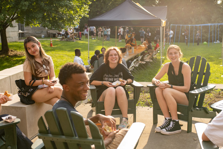 Group of students hanging out outside