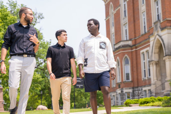 Students walking in front of East College