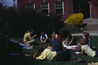 Students sitting on the grass