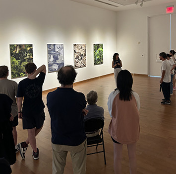 The artist Leah Beeferman talking to an audience about her exhibition