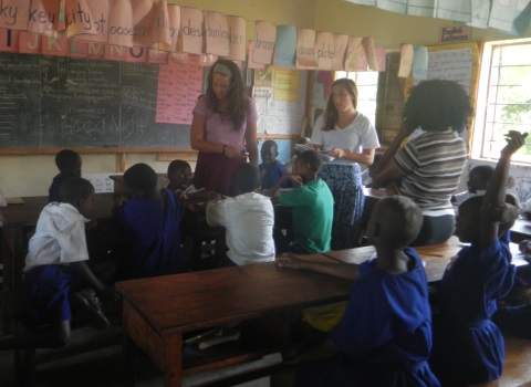 Students working at a local school in Uganda