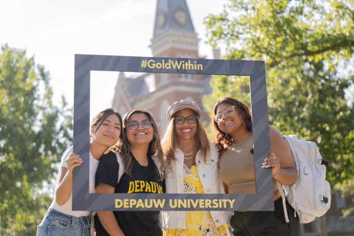 Lori S. White with students on campus